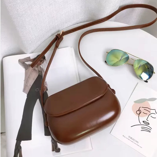 Sac à Bandoulière Rigide : Le sac tendance qui s'adapte à tout !